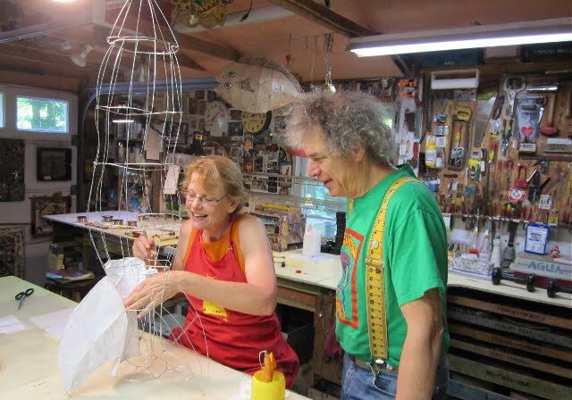 Claudia and John work on a collaborative project at Yummy Mud Puddle.
