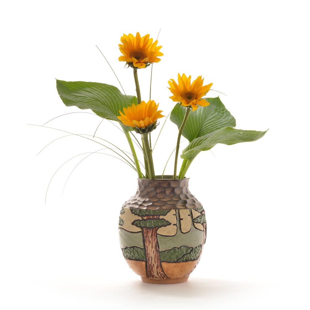 carved mountain vase